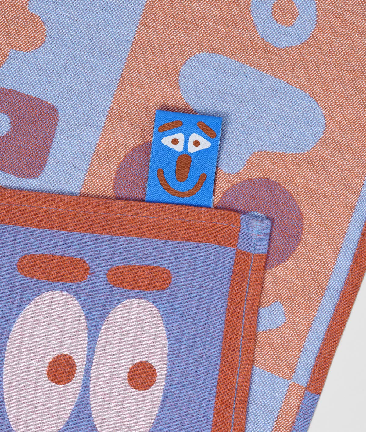 Making Faces Blue/Brown Woven Cotton Tea Towel